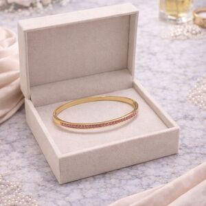 NWOT Stainless Steel Bangle Bracelet with LightPink Stone Accent